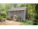 Classic two-story home featuring red shutters, well-maintained landscaping, and a cozy, inviting atmosphere at 2301 Pastille Ln, Raleigh, NC 27612
