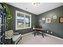 Cozy home office with natural light and ample space for productivity at 251 Olde Pl, Zebulon, NC 27597