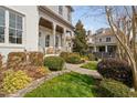 Well-manicured landscaping and stone pathways enhance the curb appeal of this beautiful home at 543 Guilford Cir, Raleigh, NC 27608