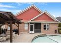 Inviting backyard showcasing a screened porch, outdoor grill, and a covered patio for entertaining at 836 Canyoncreek Ln, Fuquay Varina, NC 27526