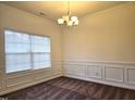 Dining room featuring decorative molding and a chandelier at 2015 Tennessee Road Rd, Durham, NC 27704