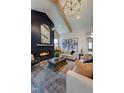 Elegant living room showcasing fireplace, decorative rug, and comfortable seating at 3218 Bruce Garner Rd, Creedmoor, NC 27522