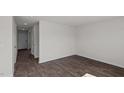 Spacious living room featuring hardwood floors, recessed lighting, and white walls at 405 Citron St, Sanford, NC 27332
