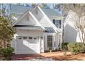 Charming home featuring a well-manicured lawn and a two-car garage at 1208 Copper Creek Dr, Durham, NC 27713