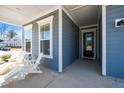 Inviting front porch with seating, offering a relaxing outdoor space with views of the neighborhood at 276 Bevis Marks Dr, Fuquay Varina, NC 27526