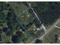 Expansive land lot perfect for building a dream home, surrounded by lush greenery at 7415 Old Oxford Rd, Bahama, NC 27503