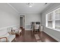 Bright office with large windows, offering a functional workspace with ample natural light and a clean, modern design at 1028 Allaire Dr, Raleigh, NC 27603