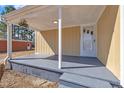 Inviting covered front porch is perfect for relaxing and enjoying the outdoors at 1403 Fairground Road Rd, Dunn, NC 28334