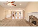 Cozy living room with fireplace, carpet, and a view of the entryway at 2504 Churchill Dr, Burlington, NC 27215