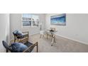 Bright home office with ample sunlight, contemporary decor, and a comfortable work environment at 3517 Strawberry Patch Row, Raleigh, NC 27604
