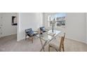 Bright office space with natural light, a glass desk, and modern decor for a productive workspace at 3517 Strawberry Patch Row, Raleigh, NC 27604