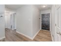 Inviting home entryway with wood-look flooring at 38 Colonial Hills Dr, Lillington, NC 27546