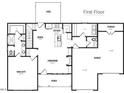 Open concept first-floor plan featuring kitchen, dining, living room, main suite, and garage at 414 Springtooth Dr, Zebulon, NC 27597