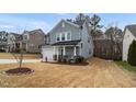 Exterior view of house with stone accents and two car garage at 105 Palladium Ct, Elon, NC 27244