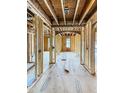 Interior view showcasing the framework of the home's entryway and future doorways at 108 Pointe Park Cir, Holly Springs, NC 27540