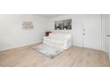 Cozy living room featuring a white sofa and stylish decor at 130 S Estes Dr # F6, Chapel Hill, NC 27514