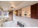 Charming porch view featuring a decorative window and brick accents at 130 S Estes Dr # F6, Chapel Hill, NC 27514