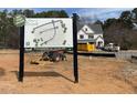 Bentwinds Bluffs new phase release sign with community map beside a new home under construction at 2313 Eagle Shot Ct # 29, Fuquay Varina, NC 27526