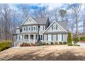 Beautiful two-story home with well-maintained landscaping, charming accents, and classic design at 260 Culbreth Rd, Chapel Hill, NC 27516
