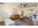 Inviting living room with hardwood floors, a ceiling fan, and comfortable seating at 4705 Blue Bird Ct # C, Raleigh, NC 27606