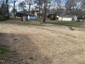 Expansive backyard space, perfect for outdoor activities and relaxation at 220 Lane Of Sir Gawaine, Garner, NC 27529