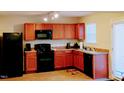 Well-equipped kitchen featuring appliances, countertops, and lots of cabinet storage space at 1141 Early Rise St, Raleigh, NC 27610
