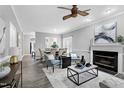 A open living space showcasing a fireplace, stylish decor, and a cohesive color scheme at 1821 Kelly Glen Dr, Apex, NC 27502