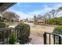 A view of neighborhood homes framed by lush greenery and landscaping at 1917 Bivins St, Durham, NC 27707