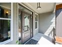 A charming front entry door with sidelights and overhead transom at 766 Horizon Dr, Pittsboro, NC 27312