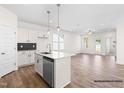 Bright kitchen features modern finishes, stainless steel appliances, and a stylish island at 130 W Saltgrass Ln, Smithfield, NC 27577