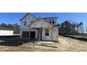 New construction home featuring modern design and covered entryway at 140 Gobbler Dr, Smithfield, NC 27577