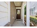 Inviting entryway with a decorative front door and white trim at 144 Sabiston Ct, Cary, NC 27519