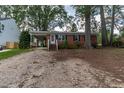 Charming brick ranch with covered parking and front yard at 3429 Dogwood Dr, Raleigh, NC 27604