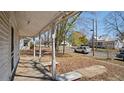 Spacious front porch with a view of the street and neighborhood, providing an inviting entrance at 404 Cherry St, Oxford, NC 27565