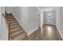 Staircase with carpet steps and white risers leading to the upper level at 9168 Dupree Meadow Dr # 15, Angier, NC 27501