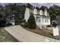 Charming two-story home with driveway, surrounded by mature trees at 104 Province Cir, Rocky Mount, NC 27804