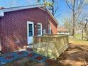 Newly constructed wooden deck that offers outdoor relaxation and entertainment space at 201 W Thorndale Dr, Oxford, NC 27565