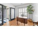 Bright office space with hardwood floors, designer wall accents, and a stylish work area at 3124 Elm Tree Ln, Raleigh, NC 27614