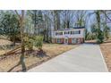 Beautiful front view of a two-story home with a long drive way and well-maintained lawn at 126 Radcliff Cir, Durham, NC 27713