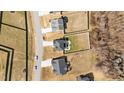 Overhead view of a home on a cul-de-sac with well-maintained landscaping, yard, and neighboring houses at 277 Martins Mill Ct, Wendell, NC 27591