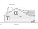 Side view of a single-Gathering home showcasing the roofline and window placements at 816 Hanson Rd, Durham, NC 27713