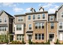 Lovely townhome exhibiting detailed siding and manicured landscaping at 234 Palmetto Tree Way, Knightdale, NC 27545