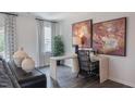 Comfortable home office space with stylish décor, a modern desk, and ample natural light at 609 Dorset Stream Dr, Fuquay Varina, NC 27526