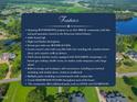 This waterfront property in an all-brick community includes lake and pool amenities and access to a private pier at 93 Shoreline Dr, Princeton, NC 27569