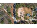 Aerial view of the property, revealing its beautiful location in a rural, wooded community at 15 Bourbon St, Fuquay Varina, NC 27526