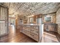 Spacious kitchen with wood cabinets, granite countertops, stainless steel appliances at 513 W Glendale St, Siler City, NC 27344