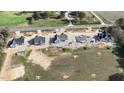 New construction community featuring various homes in progress with spacious lots and convenient access to nearby roads at 6312 River Rd, Fuquay Varina, NC 27526