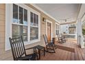 Comfortable porch setting perfect for relaxing, furnished with rocking chairs for ultimate relaxation at 2505 Francis St, Durham, NC 27707