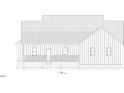 Rear view of the home with covered porch, vertical siding, and windows at 582 Harnett Central Rd, Fuquay Varina, NC 27526