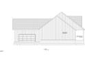 West view of the home featuring vertical siding, roofline, and garage at 582 Harnett Central Rd, Fuquay Varina, NC 27526